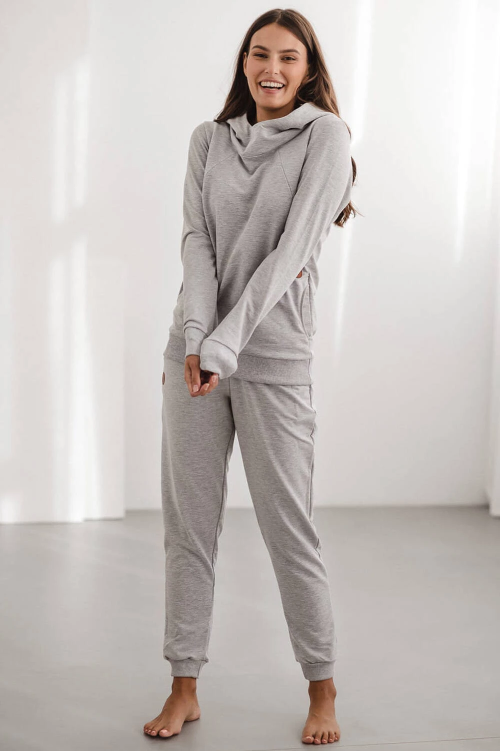 Světle šedé melanžové těhotenské tepláky