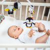 Kolotoč na dětskou postýlku Babyono s kontrastní hrací skříňkou