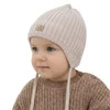Chlapecká zimní čepice, béžová, zavazovací, 100% merino vlněná, podšitá polárním merino rounem, Buno